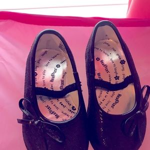 Black, sparkly Mary Janes with bow